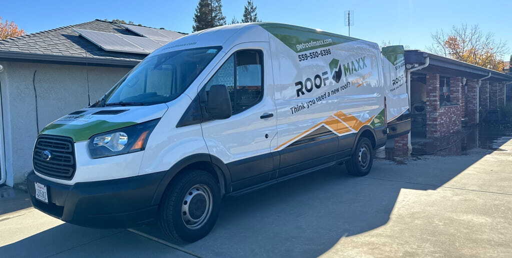 Infinite Roofing Solutions branded service vehicle